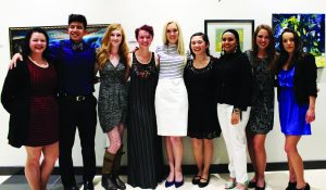 The nine seniors who showcased their artwork in the show 'Ruminations' at William Rolland Art Gallery on April 25. 
