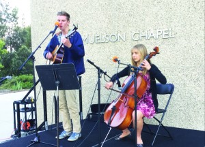 Students Caleb Arndt and Lauren Hesterman were one of the student musician groups to play at the event Faith Matters while event attendees ordered their food and participated in interfaith dialogue.