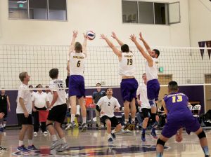 Junior right side hitter Robert Rutecki, junior middle blocker Michael Campbell, and junior setter Keaton Arutian go up for a block against Moorpark.  Photo by Jackie Rodriguez - Staff Photographer