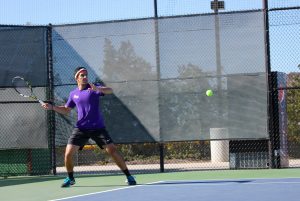 Swinging through: Cal Lutheran’s Dara Kashani delivers back against Cerritos College Jan. 28. Cerritos defeated CLU 8-1. Photo by P.K. Duncan--Staff Photographer