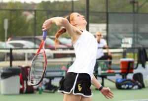 Backswing: Sophomore Sarah Seeman won her singles match and doubles match with junior Gianna Cupo against Valparaiso. Photo by Mary Crocker--Staff Photographer