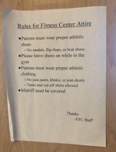 Modest is hottest: The dress code policy of the Forrest Fitness Center is posted on the front entrance door. Photo by Aliyah Navarro- Photojournalist