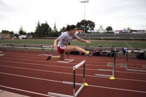 First-year hurdler Jasmine Rico practices her form during hurdles practice at the Moorpark High School track.  (Photo by Jessica Colby - Photojournalist)