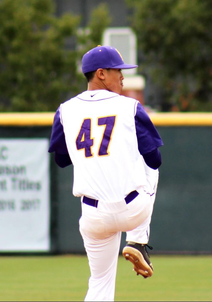 Senior left-handed pitcher Justin Fong gave up four hits in seven innings and pitched five perfect innings during the March 1 matchup against the Bulldogs. Despite letting in two runs, the pitcher struck out nine of Texas Lutheran’s batters.  (Photo by Spencer Hardie - Photojournalist)