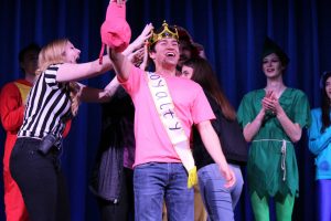 Adam Souza was crowned Mr. Kingsmen 2019 at Competing for the Crown on March 15. The first-year performed a magic trick for the talent portion, which involved guessing the page number and first word on a page from book that an audience member selected. Photo by Spencer Hardie- photojournalist. 